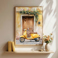 Vintage yellow scooter print above a light wood shelf with books and flowers