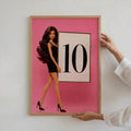 Pink fashion doll scoreboard poster showing doll in black dress holding large 10 card