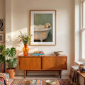 Framed dog bathtub poster styled in cozy bathroom setting