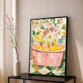 Floral bathroom wall art with three ducks in pink clawfoot tub