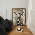 Giraffe art poster leaning in room corner