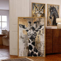 Large giraffe wall art leaning on floor