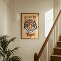 Tiger typography wall art hanging beside staircase