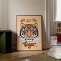 Framed Go Get Em Tiger wall art leaning on floor