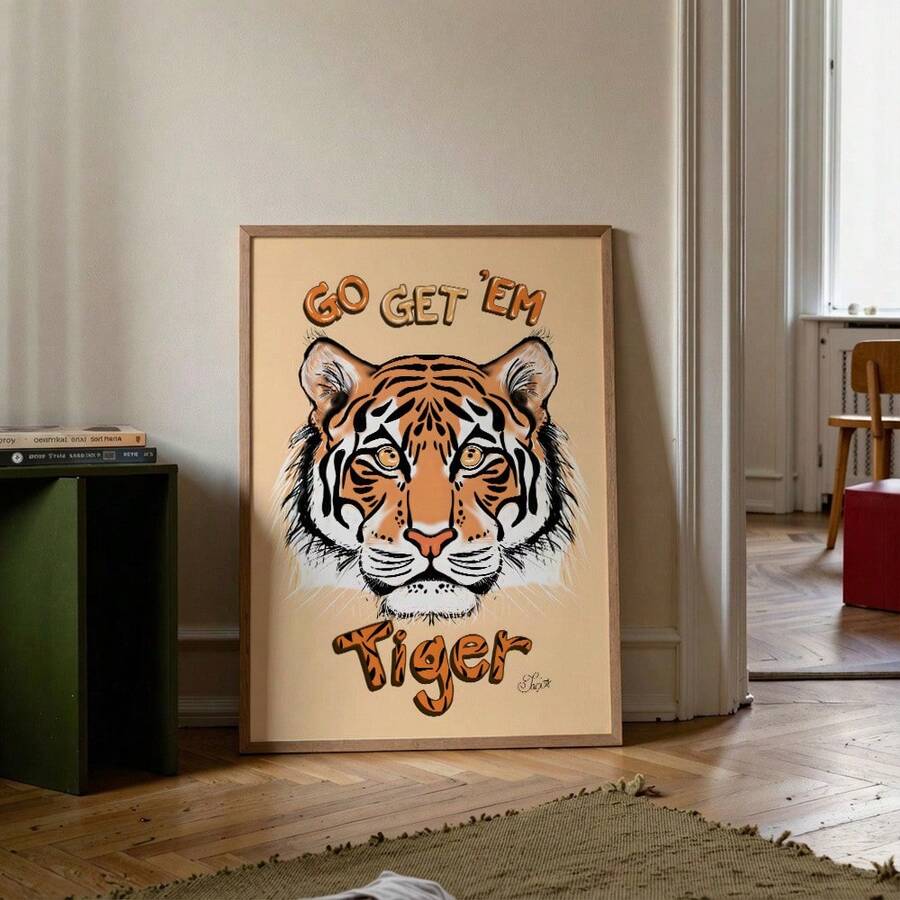 Framed Go Get Em Tiger wall art leaning on floor