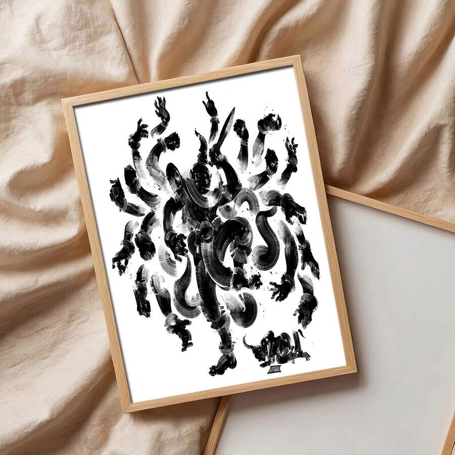 Wood framed black brush deity print lying on beige fabric close product styling