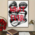 Framed pop art lips poster above desk with roses books lamp and red text