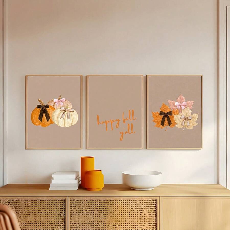 Neutral fall gallery wall with pumpkin, seasonal quote, and leaf prints above a wood console