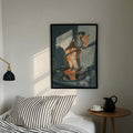 Black framed DJ cat poster above bed