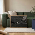 Football action canvas poster near green sofa