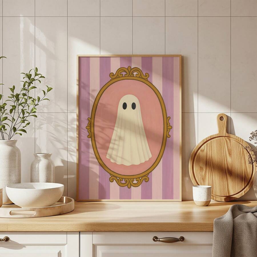 Pastel Halloween ghost artwork styled on a kitchen counter