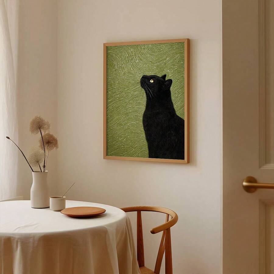 Minimalist black cat print with yellow eye and green background