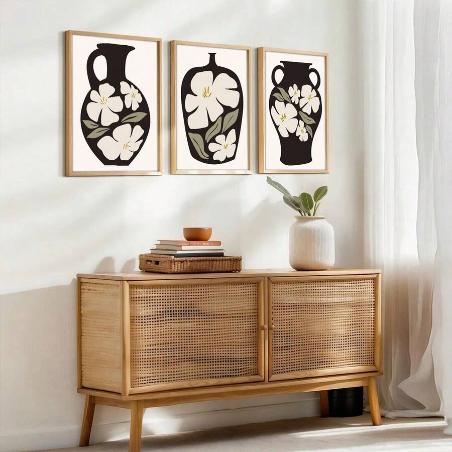 Scandinavian floral canvas set styled above a dining console