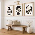 Minimalist flower vase poster set in a bright modern room