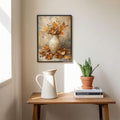 Small framed autumn maple leaf pitcher poster above wood table with jug books and snake plant