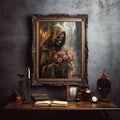 Grim reaper rose poster hangs above dark academia desk with books mirror and candle