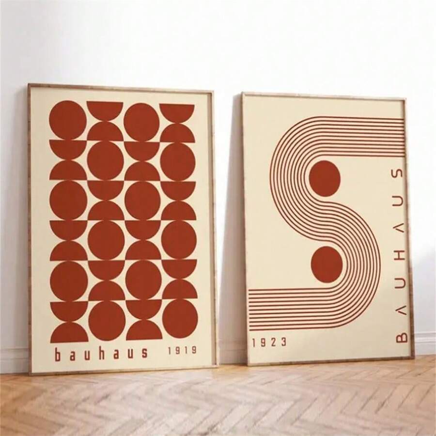Two-piece terracotta Bauhaus wall art above rust living room sofa