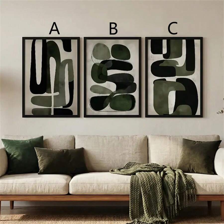 A B C labeled olive abstract wall art designs above a cream sofa