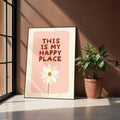 Pink daisy quote poster leaning on floor