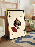 Leopard print ace of spades lucky poster in gold frame leaning near sofa with red lips and gold hearts