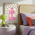 Framed motivational typography print in a warm bedroom