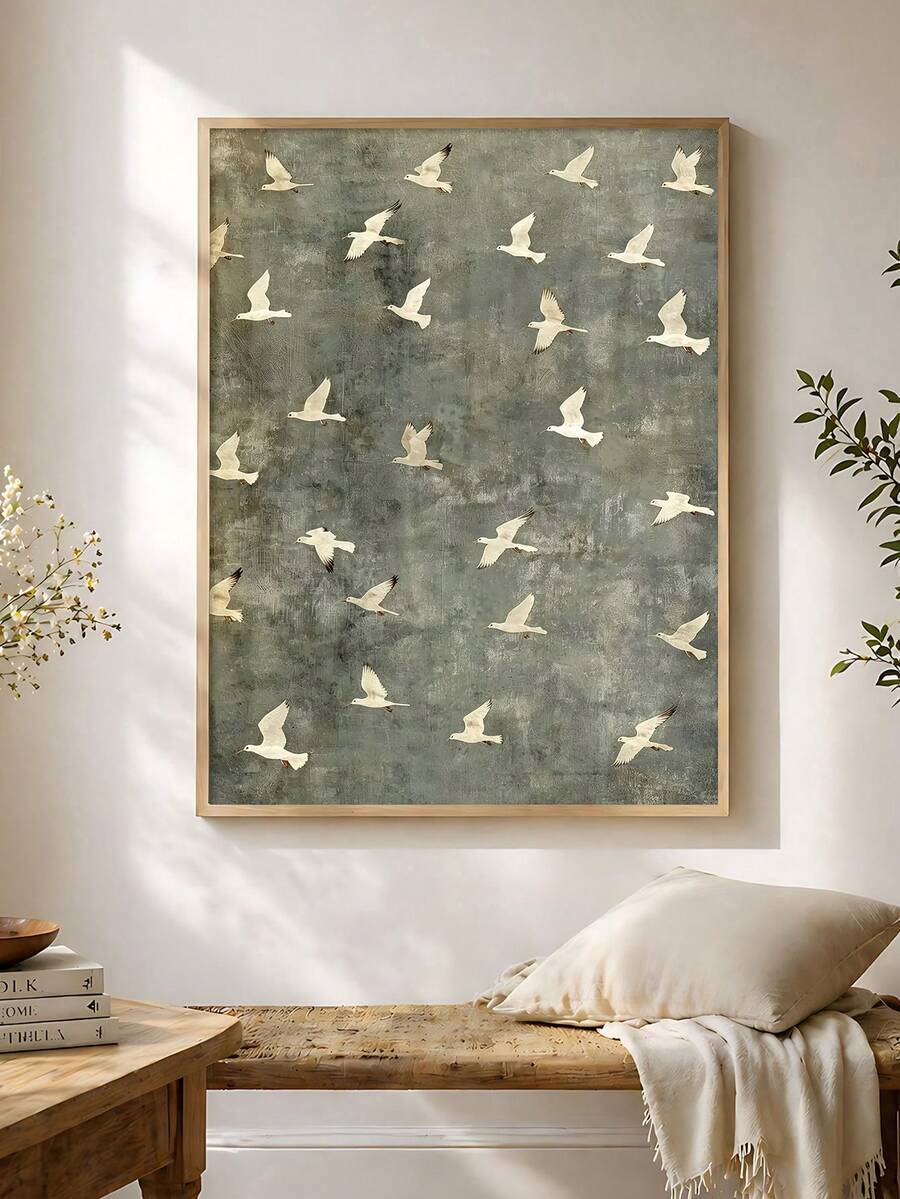Blue gray bird wall art styled in a bright bedroom with a bench