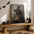 Dark witch portrait print on rustic bench with Halloween decor
