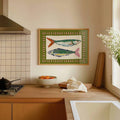 Horizontal two-fish wall art mounted above wood counter in modern neutral kitchen
