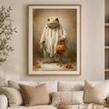 Matted Halloween frog canvas art above cream sofa