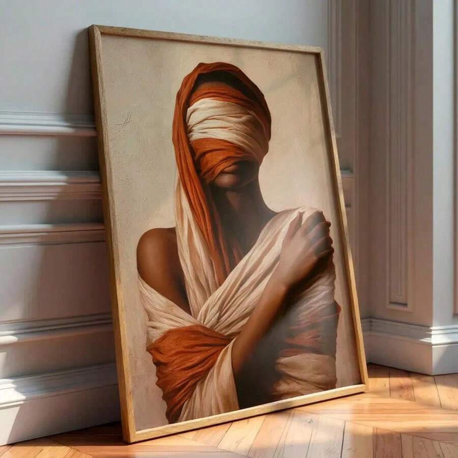 Framed portrait of draped figure in rust and ivory cloth on sunlit wood floor