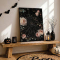 Black framed pink rose artwork with a jeweled spiderweb in Halloween decor