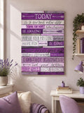 Purple positive affirmation wall art above a white desk in a home office