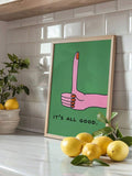 Cheerful thumbs-up poster reading It's All Good on a bright kitchen counter