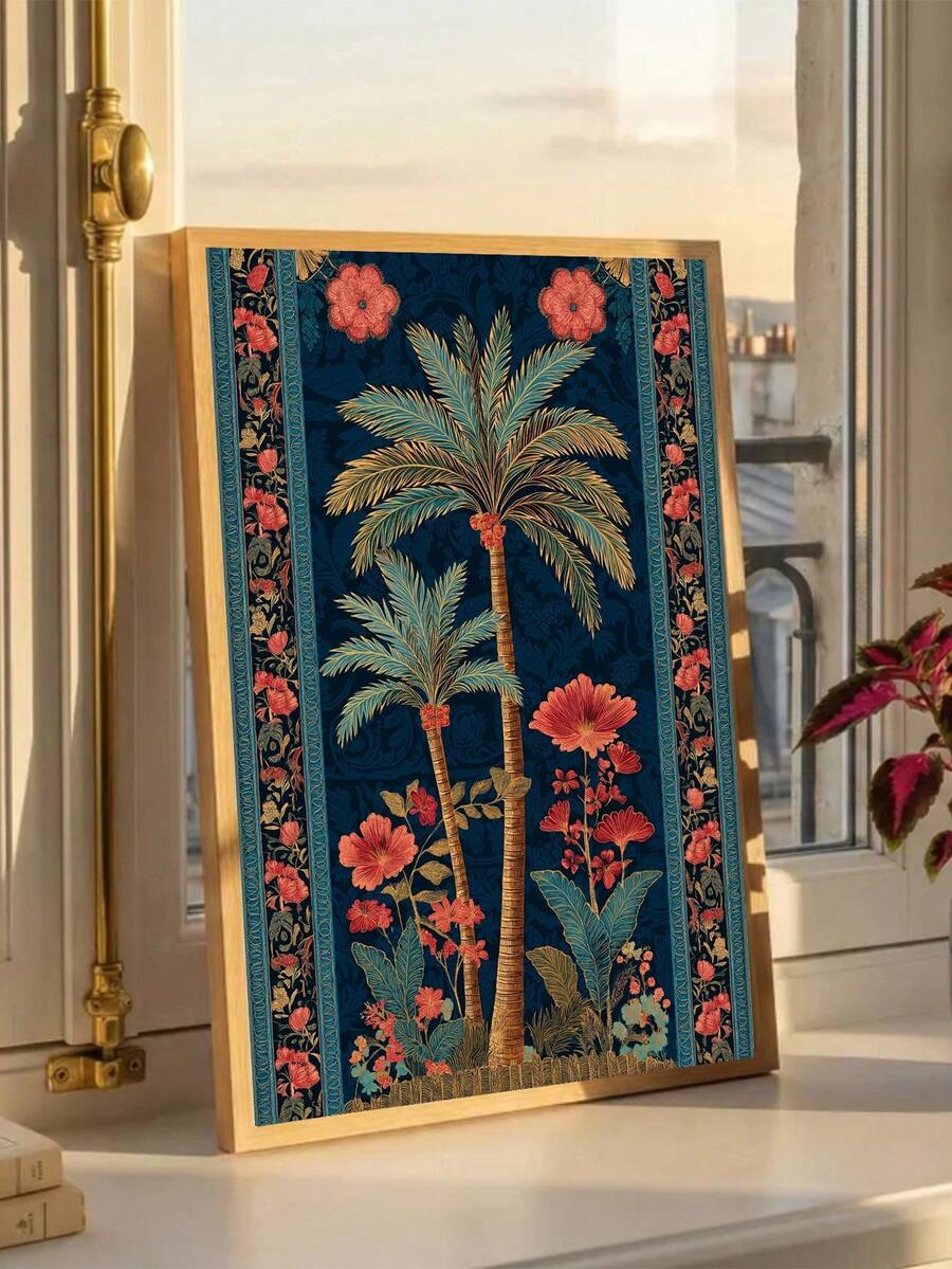 Gold-tone framed tropical palm tree poster with teal leaves and coral flowers on sunny window sill