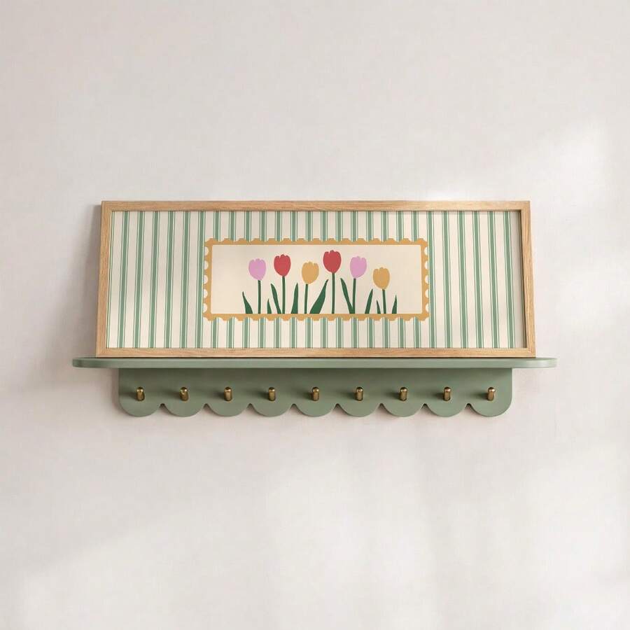 Sage green striped tulip artwork above an entryway shelf