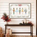 Nutcracker holiday canvas art above console with greenery