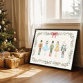 Framed Christmas ballet poster near tree and gifts