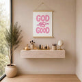 God Is Good pink faith poster displayed as a wooden hanging scroll