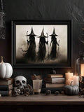 Monochrome three-witches canvas art with robed figures