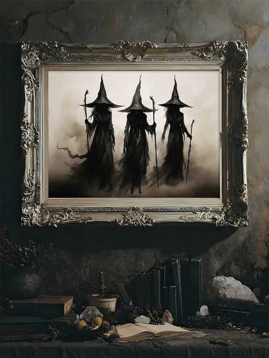 Framed black and beige witch poster beside books and crystals