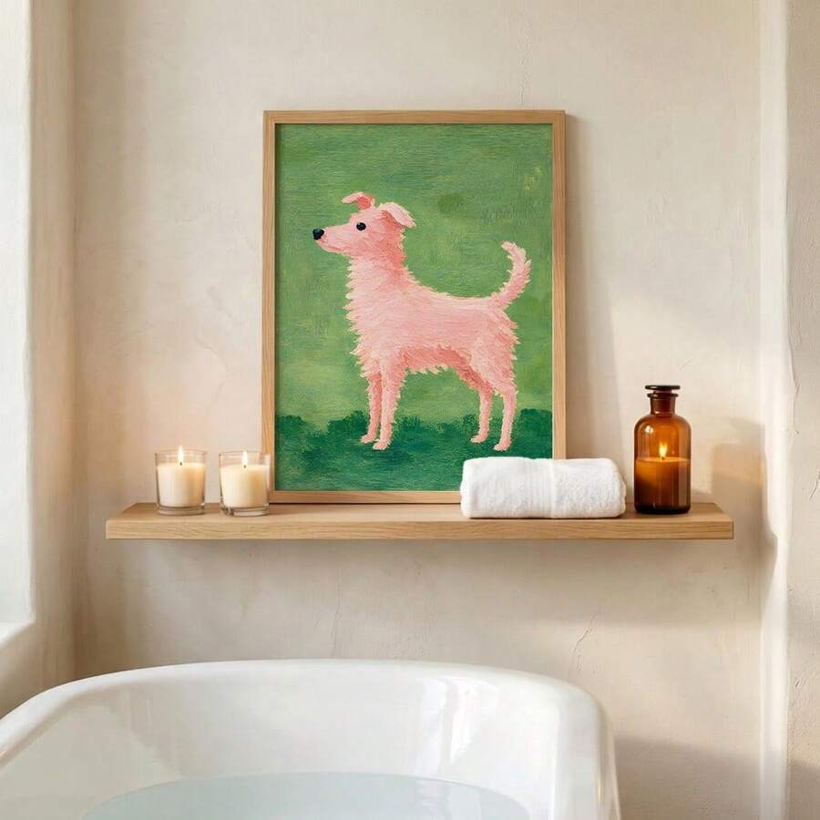 Pink dog canvas poster in wood frame above bathtub shelf with candles