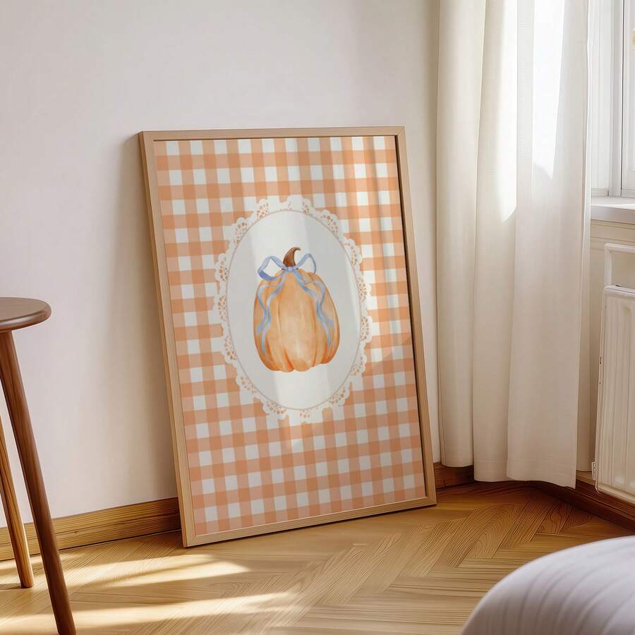 Framed preppy pumpkin poster beside bright bedroom window