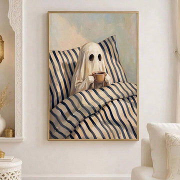 Whimsical ghost drinking coffee in bed framed wall art