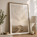 Neutral Christian cross print leaning among pottery and greenery