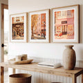 Rustic autumn shopfront triptych over natural wood sideboard