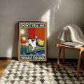 Sarcastic lounging cat canvas in warm reading nook