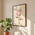 Botanical canvas print shown with light wood frame option