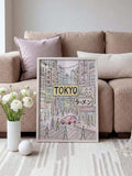 Pink Japanese wall art with TOKYO text by sofa