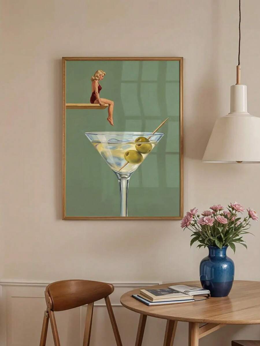 Dirty martini swimmer poster above round dining table with flowers and pendant lamp