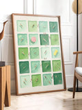 Large framed aqua and green pool-grid swimmer print leaning in modern living room